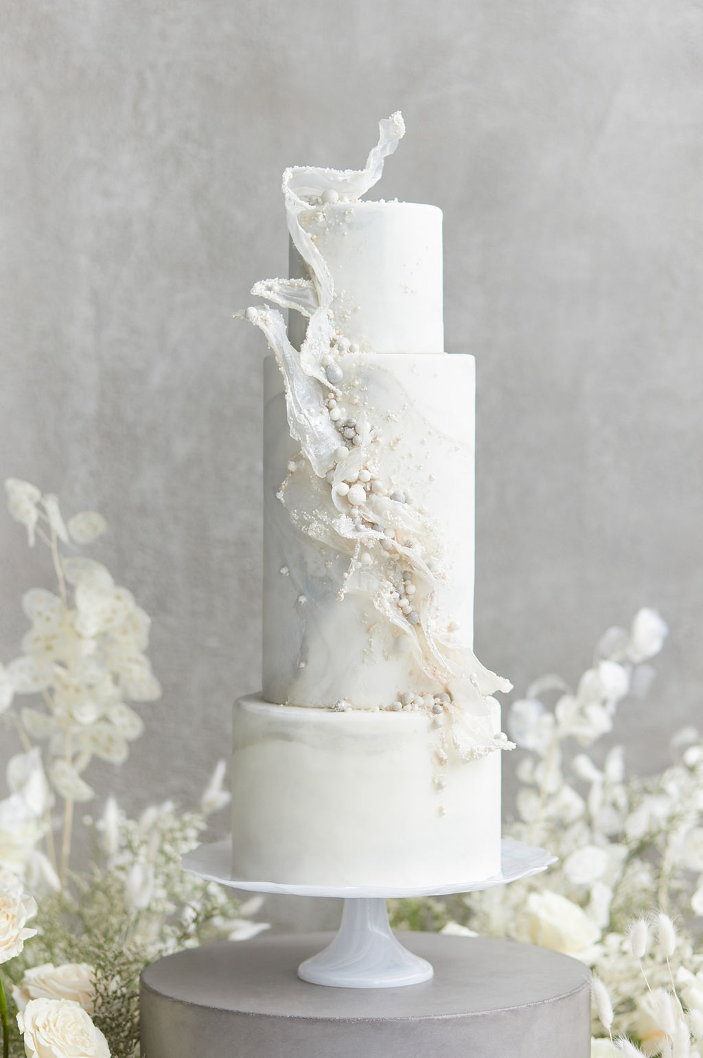 white marble three-tier wedding cake