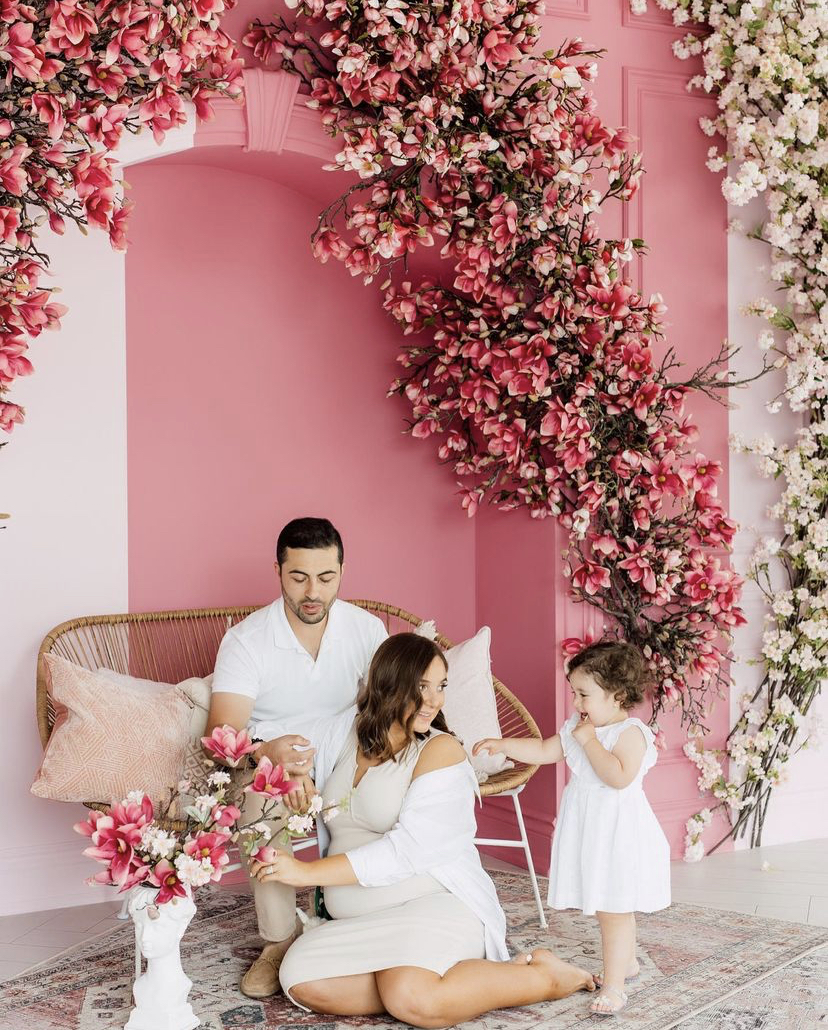 Family portrait in a floral summer setup